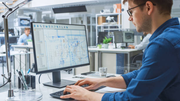 An image of a person working on a computer.